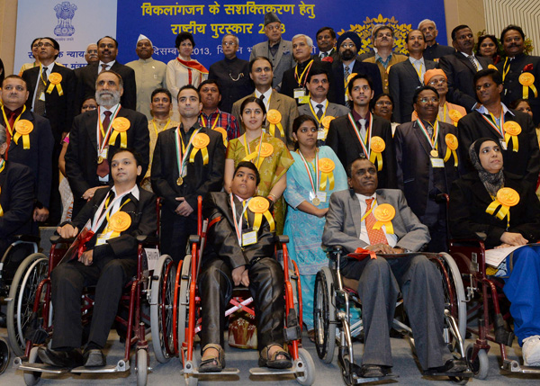 The President of India, Shri Pranab Mukherjee with recipients of National Award for the Empowerment of Persons with Disabilities for the year 2013 on the occasion of International Day of Disabled Persons at Vigyan Bhavan, New Delhi on December 3, 2013.