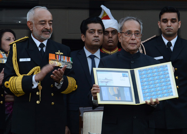 The President of India, Shri Pranab Mukherjee releasing a commemorative postage stamp on the occasion Navy Day Reception hosted by the Chief of Naval Staff at Navy House in New Delhi on December 4, 2013. Also seen is the Chief of Naval Staff, Admiral D.K.