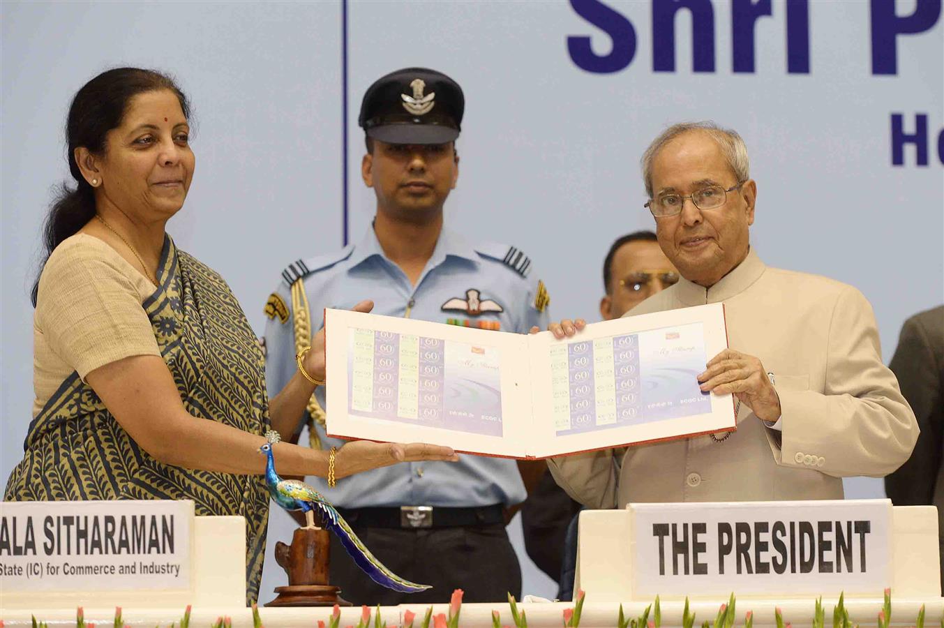 The Union Minister of State [I/C] for Commerce and Industry, Smt. Nirmala Sitharaman releasing the Special Stamp of ECGC and presenting first copy to the President of India, Shri Pranab Mukherjee at the inauguration of Diamond Jubilee Celebrations of Expo 