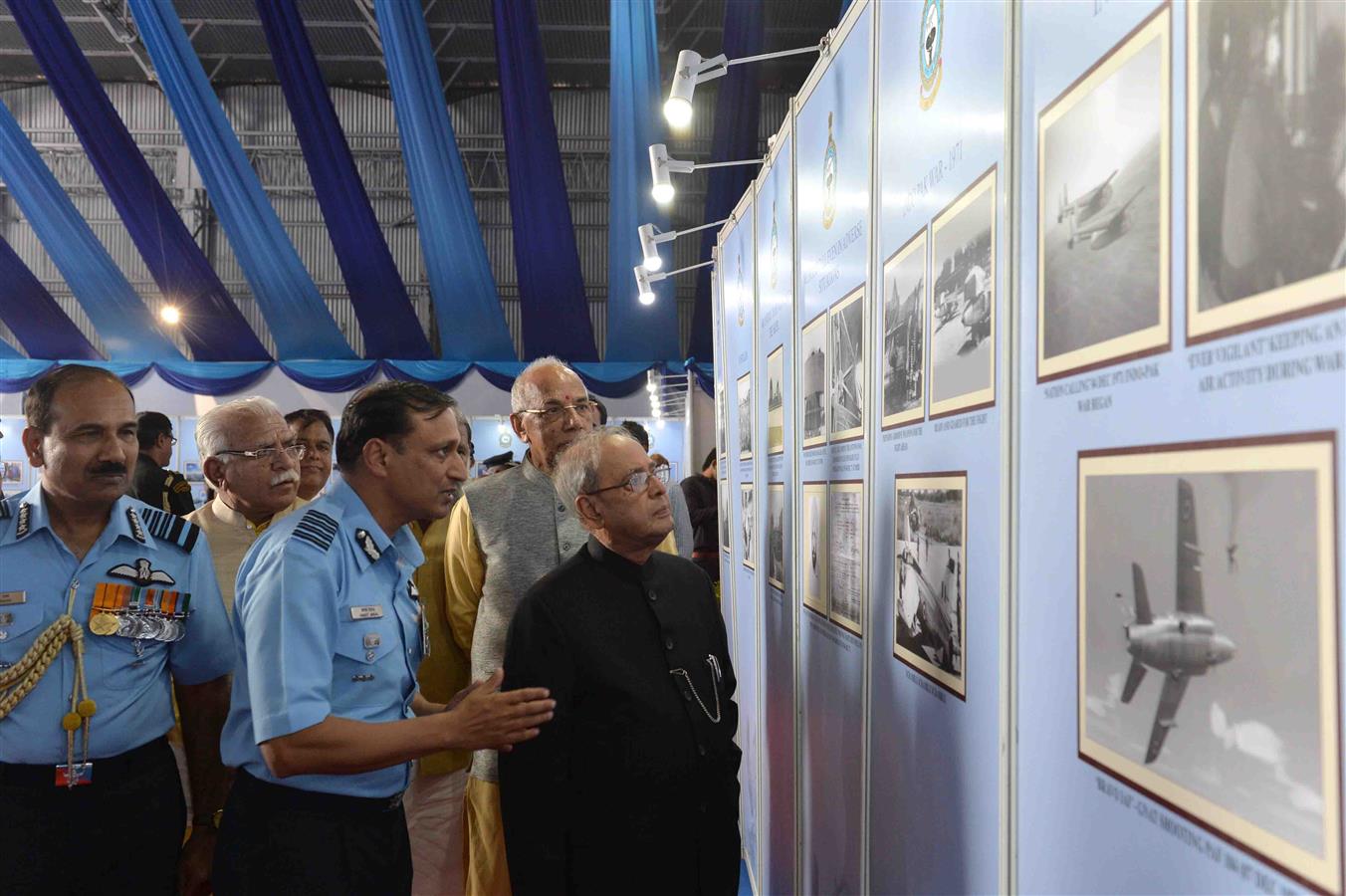 The President of India, Shri Pranab Mukherjee viewing the Photo Exhibition at the presentation of Standards to 501 Signal Unit and 30 Squadron of Indian Air Force at Air Force Station, Ambala in Haryana on November 10, 2016. 