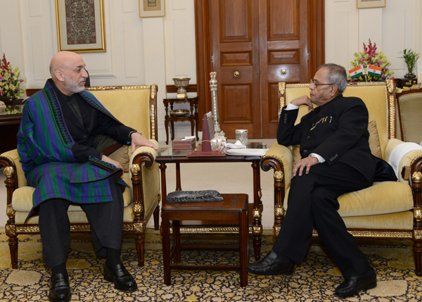 The President of the Islamic Republic of Afghanistan, H.E. Dr. Hamid Karzai meeting with the President of India, Shri Pranab Mukherjee at Rashtrapati Bhavan in New Delhi on December 13, 2013.