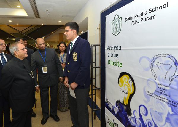 Aakanxit Khullar a class XII student of DPS R.K. Puram explaining to the President of India, Shri Pranab Mukherjee, the daily power saver campaign to reduce electricity consumption of the school by 25% that he conceived and launched from January this year