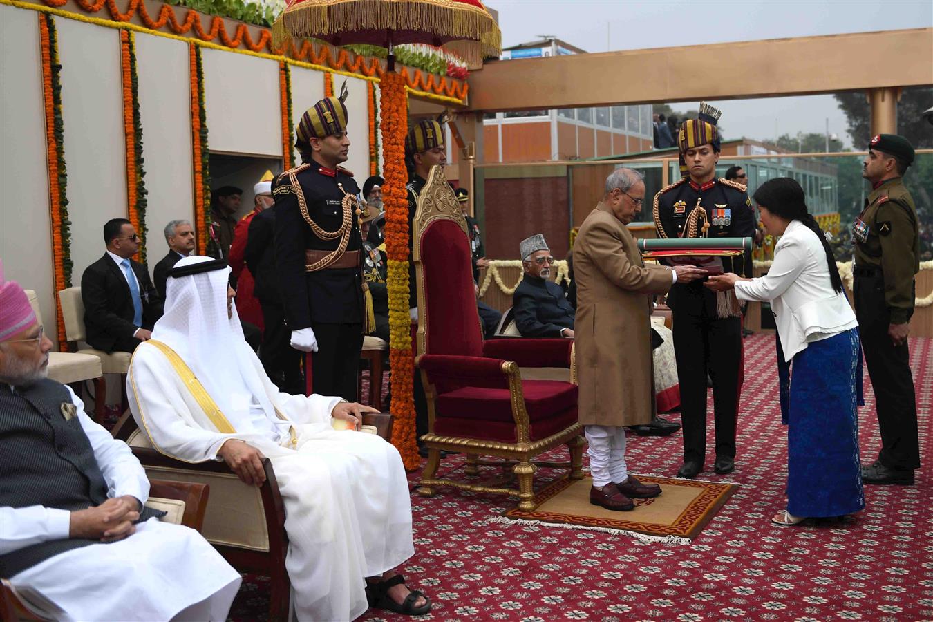 The President of India, Shri Pranab Mukherjee conferring the Ashoka Chakra (the highest peacetime gallantry award) posthumously on Havildar Hangpan Dada, the Assam Regiment /35th Battalion the Rashtriya Rifles at the 68th Republic Day Parade at Rajpath in