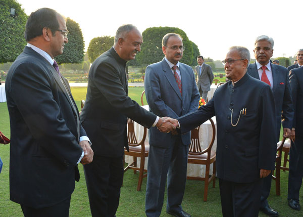 The President of India, Shri Pranab Mukherjee meeting the officers of Police and Para Military Services on the lawns of the Mughal Gardensat Rashtrapati Bhavan in New Delhi on February 3, 2014. 