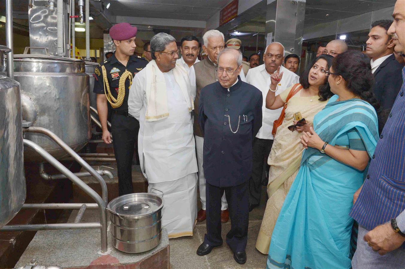 The President of India, Shri Pranab Mukherjee visiting the Adamya Chetana-Midday Meal Kitchen for over one lakh children at Bengaluru December 30, 2016. 