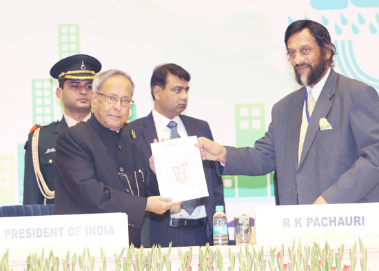 The President of India, Shri Pranab Mukherjee receiving the first copy of manual “GRIHA for Large Development” from the President of the ADaRSH and Director General of TERI, Dr.R.K. Pachauri at the inaugural function of National Conference of Green Design