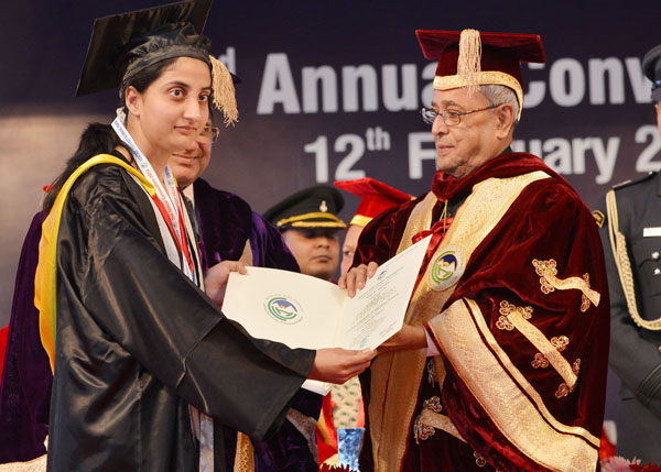 The President of India, Shri Pranab Mukherjee while presenting a degree to the student at the 2nd Annual Convocation of the Central University of Himachal Pradesh at Shahpur, District Kangra in Himachal Pradesh on February 12, 2014. 