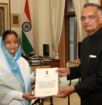 The President of India, Smt. Pratibha Devisingh Patil receiving the Report on 'Farmer-Industry Partnership' from the Governor of Punjab, Shri Shivraj Patil, at Rashtrapati Bhavan on July 12, 2012 . The President had set up a 13- member committee on Octobe