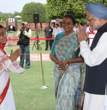 The President of India, Smt. Pratibha Devisingh Patil, the Prime Minister of India, Dr. Manmohan Singh and the Speaker of the Lok Sabha, Smt. Meira Kumar at the 'At Home', hosted by the President at the Mughal Gardens of Rashtrapati Bhavan on July 22, 201